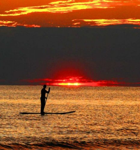 sunset paddler
